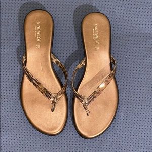Nine West bronze slip on flat sandal. Never worn